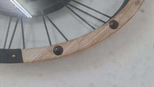 שעון קיר גלגלי שינים אובלי 68 * 65 ס"מ